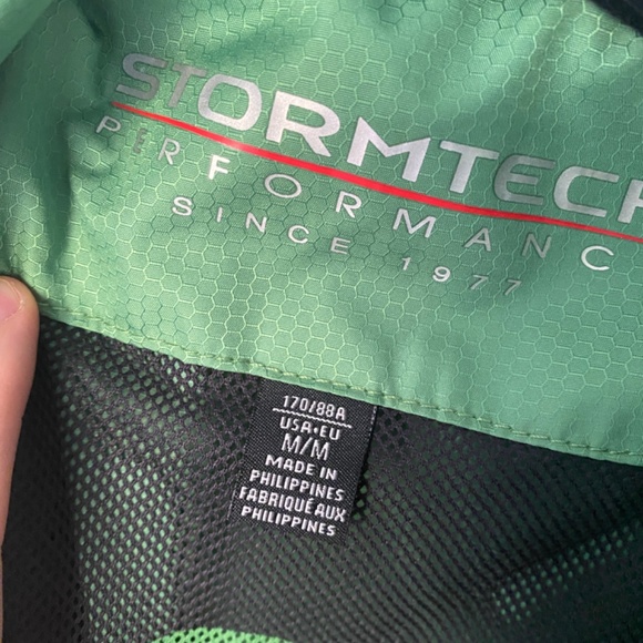 Stormtech green men’s rain jacket size M - Picture 2 of 2